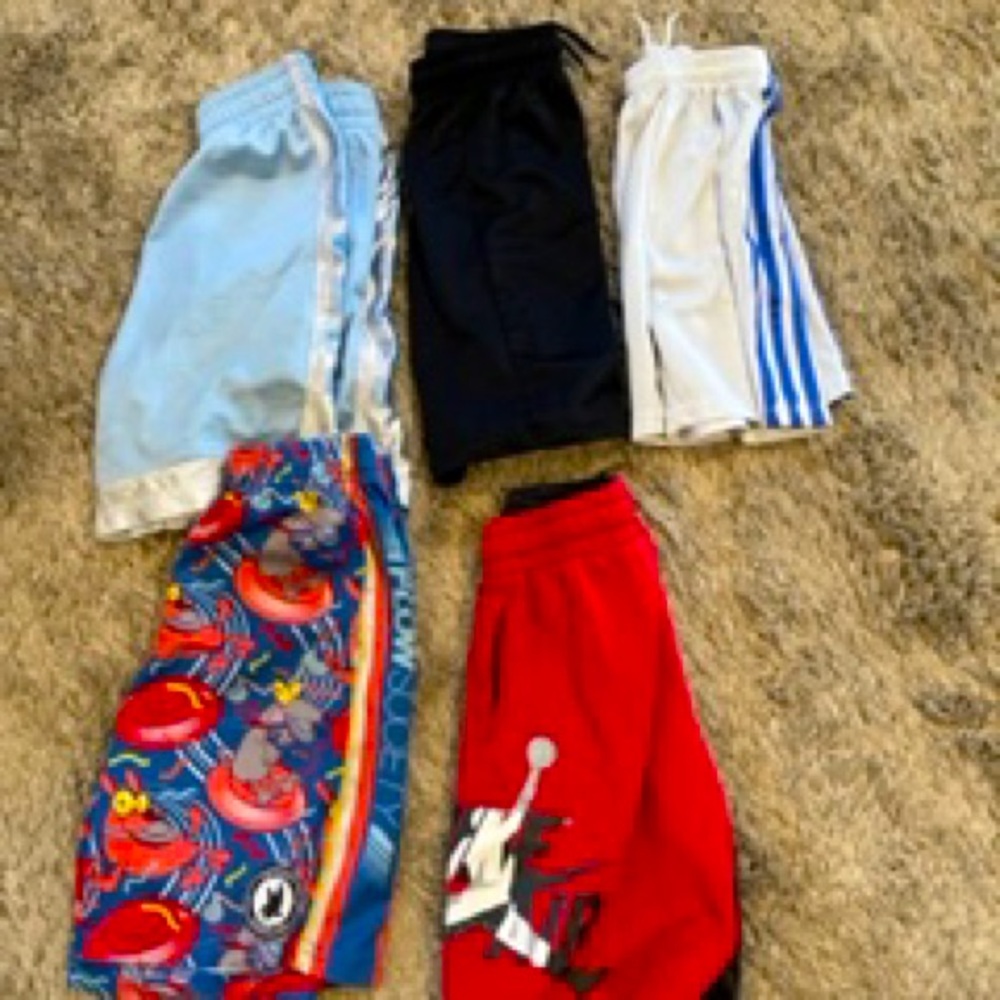 Boys Nike shorts and one pair of flow society shorts. All youth small